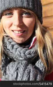 portrait of young woman at ski resort