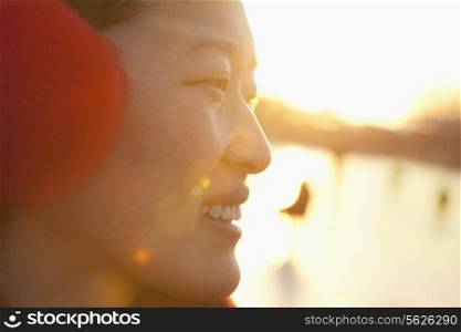 Portrait of Young Woman at Sunset on Ice Rink