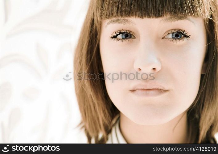 portrait of young woman,focus point on eye (toned photo f/x)