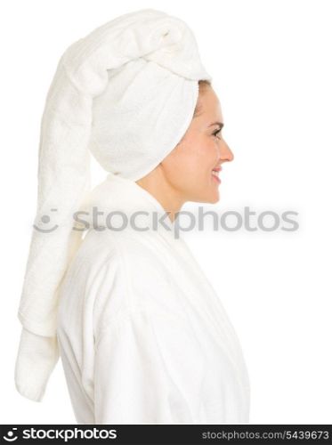 Portrait of young woman in bathrobe in profile