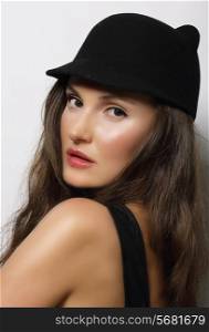Portrait of Young Woman in Dark Hat