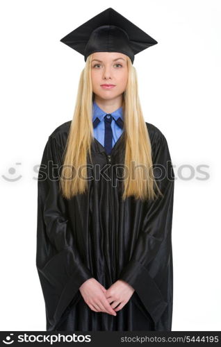 Portrait of young woman in graduation gown