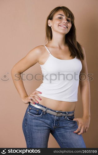 Portrait of young woman in jeans