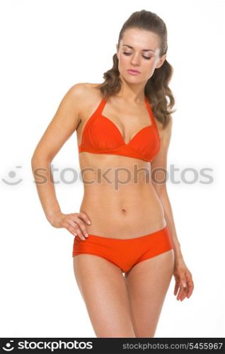 Portrait of young woman in swimsuit posing