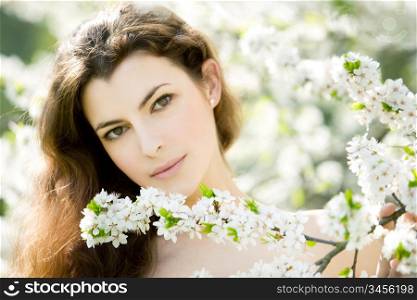portrait of young woman in the garden, shallow DOF