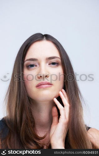 portrait of young woman isolated on white background in studio