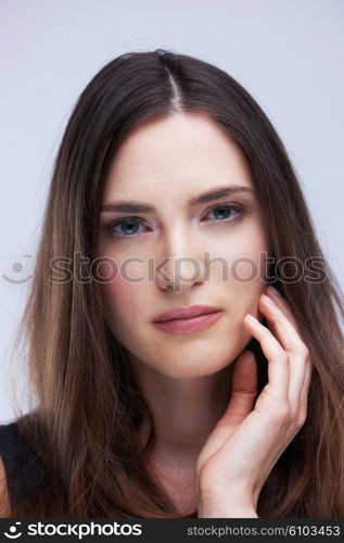 portrait of young woman isolated on white background in studio