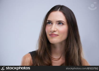 portrait of young woman isolated on white background in studio