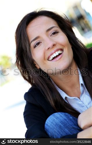 Portrait of young woman laughing