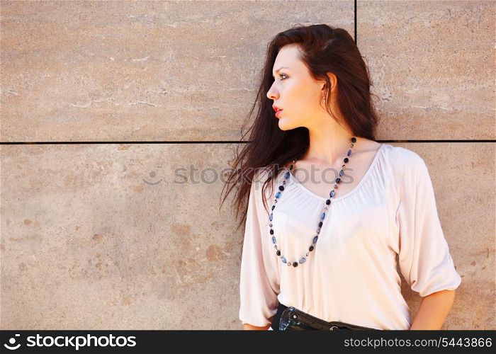 Portrait of young woman looking on copyspace