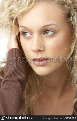 Portrait Of Young Woman Looking Thoughtful