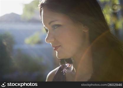 Portrait of young woman outdoors