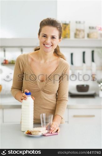 Portrait of young woman ready for breakfast