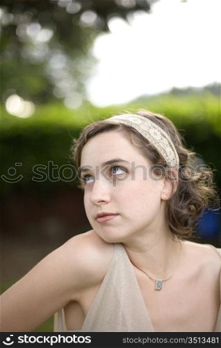 Portrait of Young Woman Shrugging and Looking Away