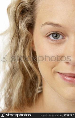 Portrait Of Young Woman Smiling At The Camera