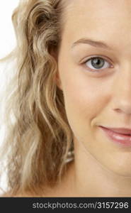 Portrait Of Young Woman Smiling At The Camera