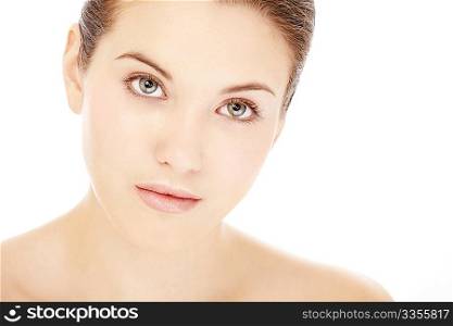 Portrait of young woman with a healthy skin of the face, isolated on a white background