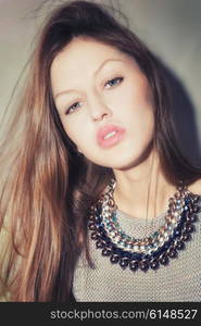 Portrait of young woman with beautiful long hair