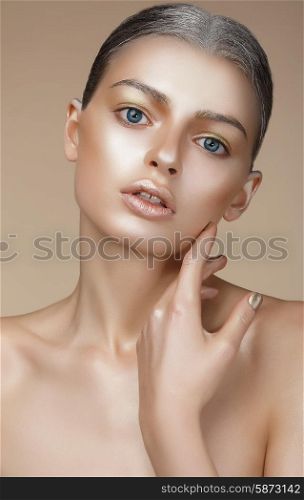 Portrait of Young Woman with Bronzed Skin