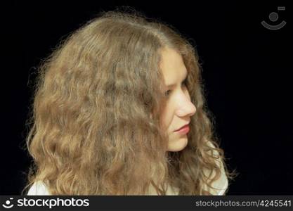 Portrait of young woman with long brown nature hair