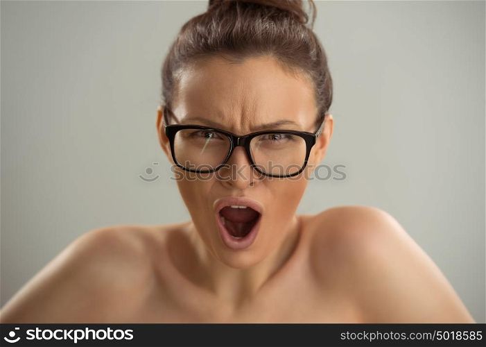 Portrait of young woman wondering perfect vision wearing stylish black eye glasses