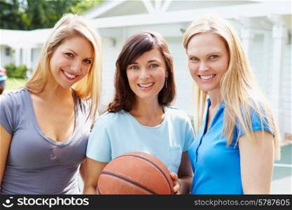 Portrait Of Young Women Playing Basketball Match