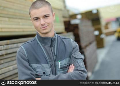 Portrait of young worker in builders merchants