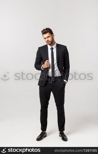 Portrait onfident young handsome businessman or model looking at camera isolated on white background.. Portrait onfident young handsome businessman or model looking at camera isolated on white background