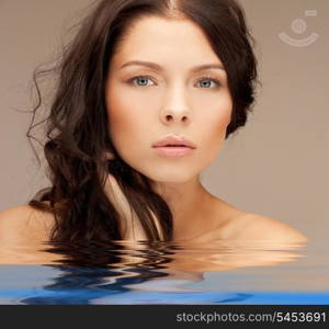 portrait picture of beautiful woman in water