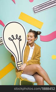 portrait schoolgirl with big light bulb . Resolution and high quality beautiful photo. portrait schoolgirl with big light bulb . High quality and resolution beautiful photo concept