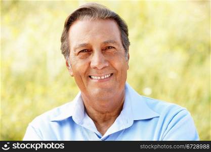 Portrait senior Hispanic man outdoors