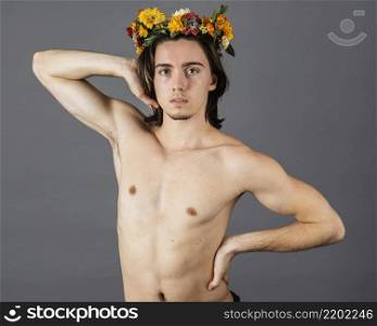 portrait shirtless man with flower crown