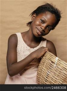 portrait smiley girl with straw basket