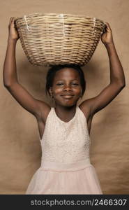 portrait smiley girl with straw basket head