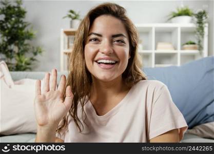 portrait smiley woman waving 2
