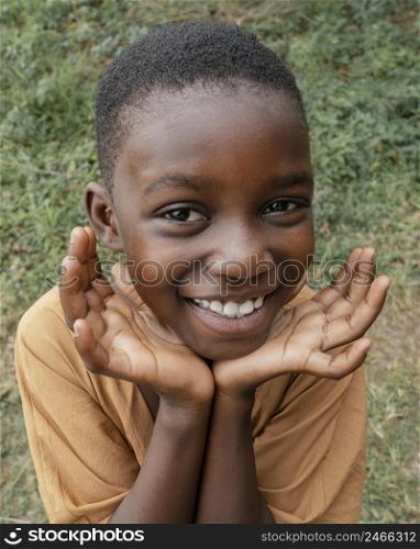 portrait smiley young african boy