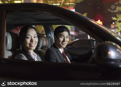 Portrait Smiling Business People In Car