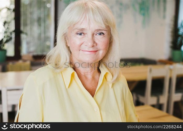 portrait smiling elderly gray haired woman