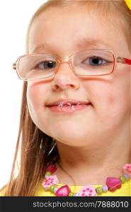 Portrait smiling little girl in glasses doing fun studio shot isolated on white background