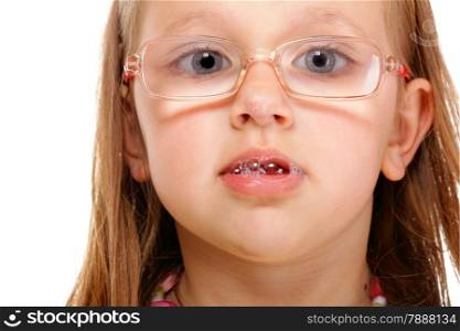 Portrait smiling little girl in glasses doing fun studio shot isolated on white background
