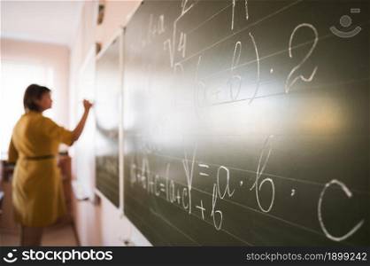 portrait teacher writing chalkboard. Resolution and high quality beautiful photo. portrait teacher writing chalkboard. High quality beautiful photo concept