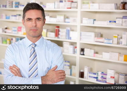 Portrait UK pharmacist at work