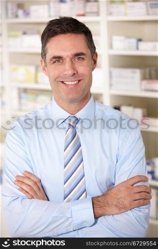 Portrait UK pharmacist at work