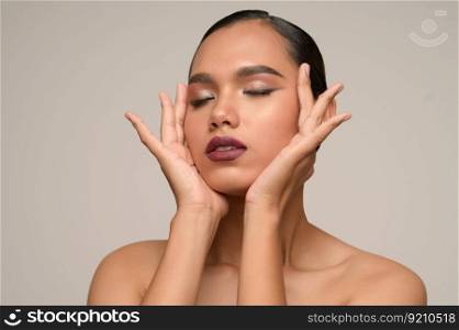 Portrait with manicure hands of beautiful asian woman touch cheek and close her eyes beautiful natural clean skin nature make up,  fresh spa female beauty cometic, copy space