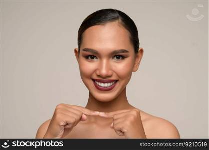 Portrait with manicure hands of beautiful asian woman touch finger and finger with big smile, beautiful natural clean skin nature make up,  fresh spa female beauty cometic, copy space