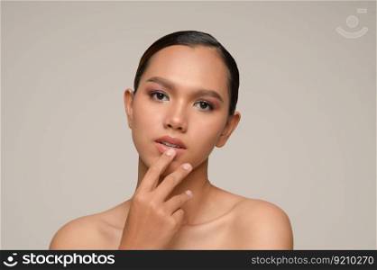 Portrait with manicure hands of beautiful asian woman touch mouth and smile, beautiful natural clean skin nature make up,  fresh spa female beauty cometic, copy space
