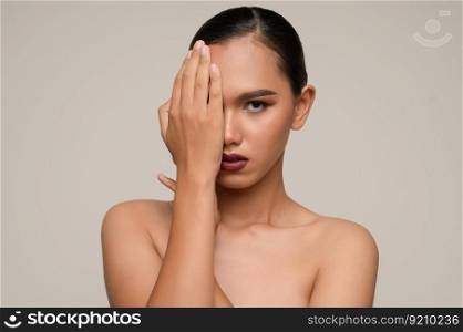 Portrait with manicure hands of beautiful asian woman use hand cover her eye,, beautiful natural clean skin nature make up,  fresh spa female beauty cometic, copy space