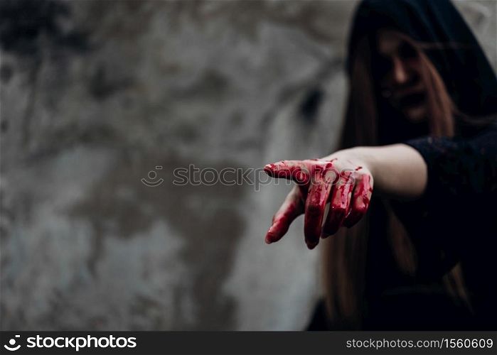Portrait woman ghost devil demon costume horror and scary she has point finger out and hand have red blood, Happy Halloween day concept