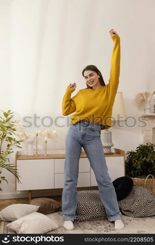 portrait woman home dancing