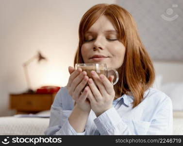 portrait woman home drinking coffee